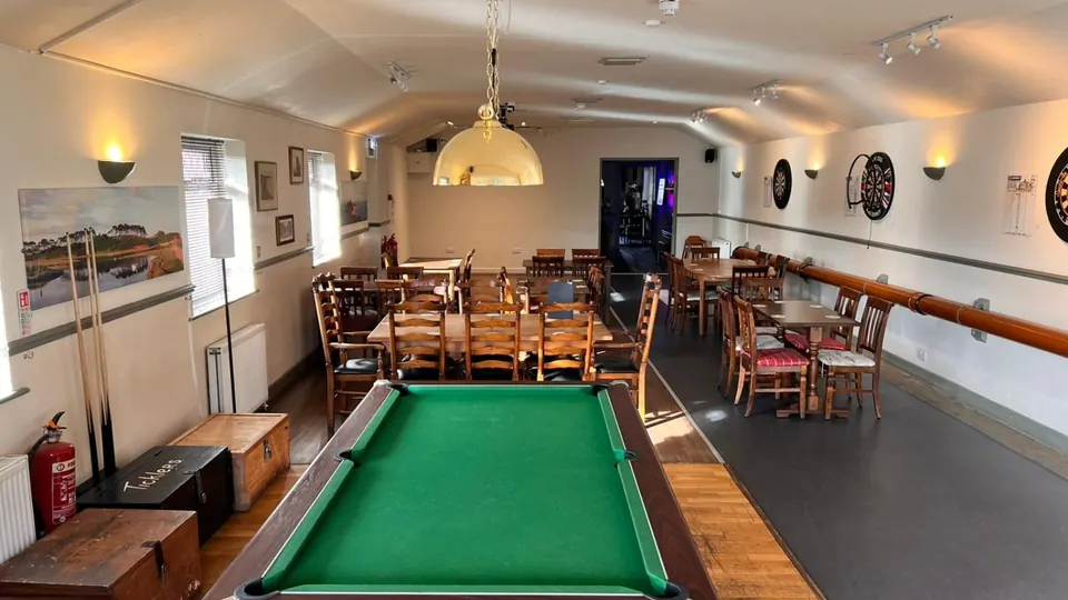 Pool table and dartboards in the function room